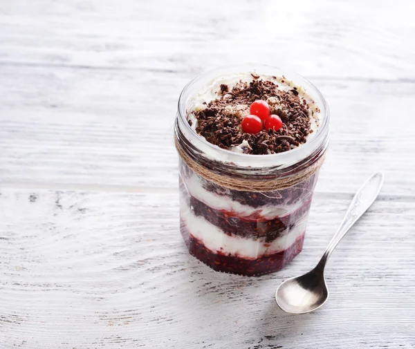 Delicious dessert in jar on table close-up — Stock Photo, Image