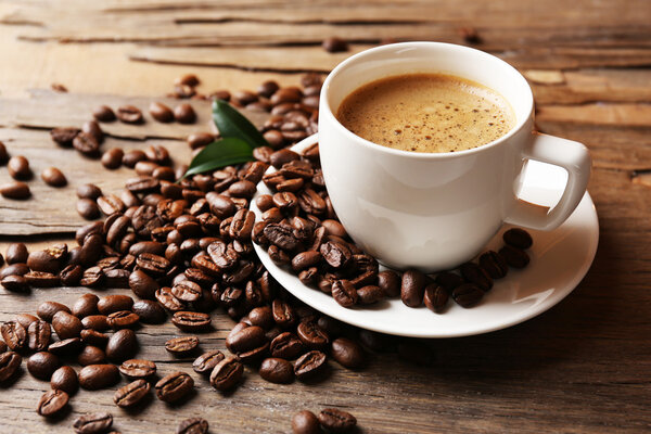 Cup of coffee on wooden table