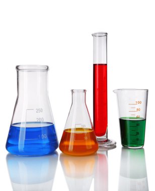 Tüp ve şişe ışık arka plan üzerinde renkli sıvı ile