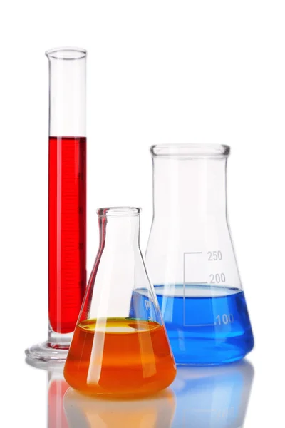 Test-tube and flasks with colorful fluid isolated on white — Stock Photo, Image