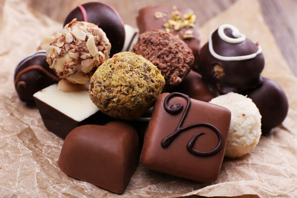 Chocolates assorted on crumble paper