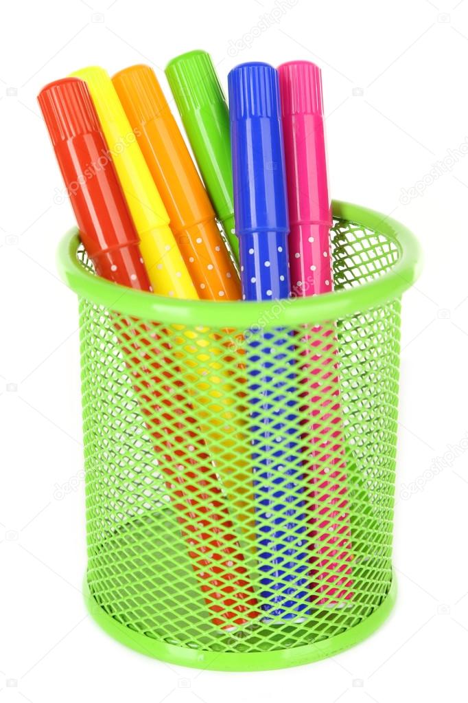 Colorful markers in metal vase