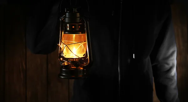 Lantern in hands — Stock Photo, Image