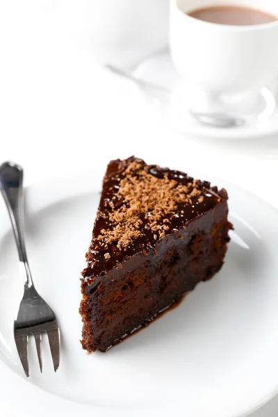 Yummy chocolate cake served on table — Stock Photo, Image