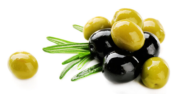 Green and black olives with long leaves isolated on white