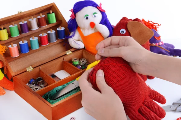 Making of handmade toys from gloves on white background — Stock Photo, Image
