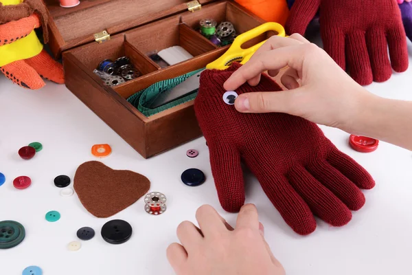 Making of handmade toys from gloves on white background — Stock Photo, Image