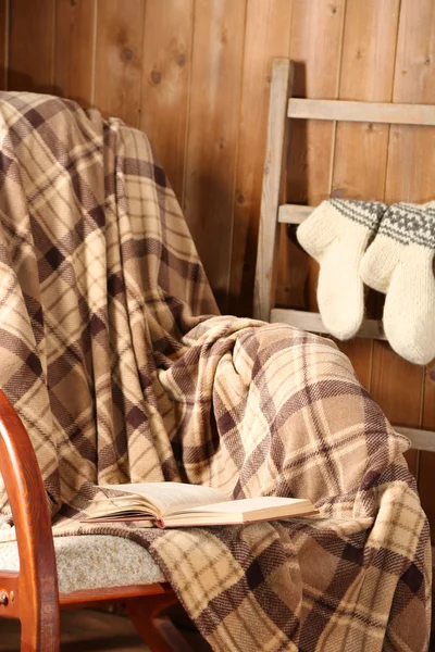 Rocking chair with plaid