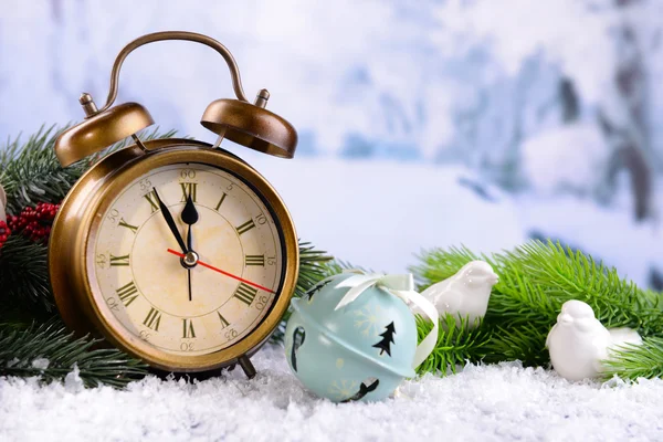 Alarm clock with Christmas decorations — Stock Photo, Image