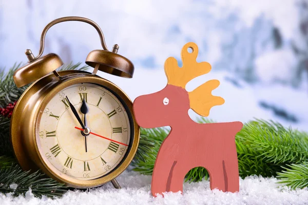 Alarm clock with Christmas decorations — Stock Photo, Image