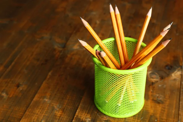 Pencils in metal holder — Stock Photo, Image