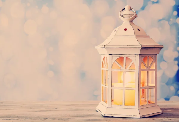 Lantern on wooden table — Stock Photo, Image