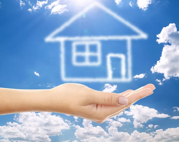 House clouds shape floating on hand — Stock Photo, Image