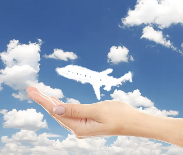 Forma de nubes de avión flotando en la mano —  Fotos de Stock