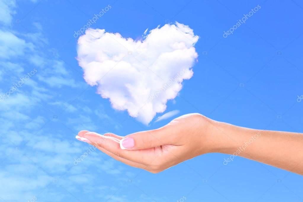 Heart clouds shape floating on hand  stock photo  belchonock 60928511