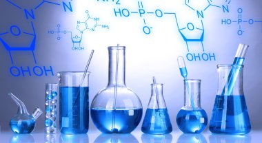 Test tüpleri renk arka plan üzerinde mavi sıvı ile