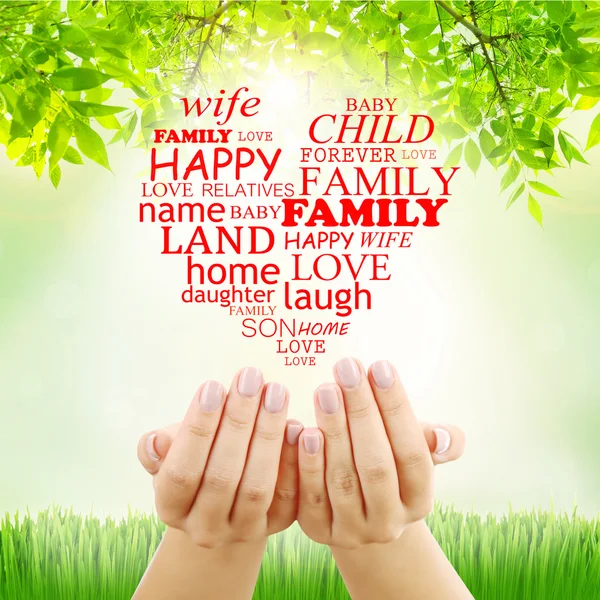 Family concept, family word cloud in hands — Stock Photo, Image