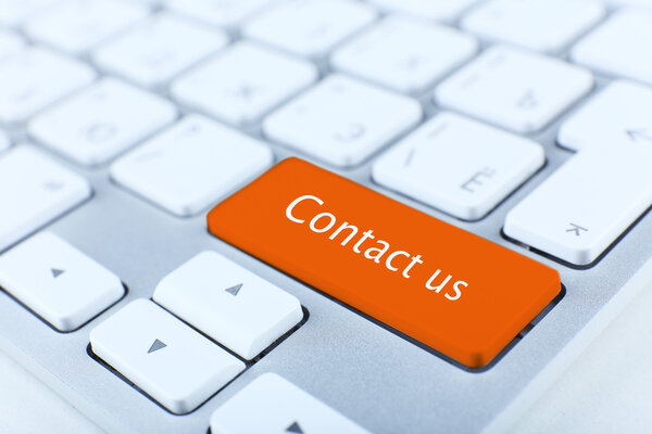 Close up of CONTACT US keyboard button