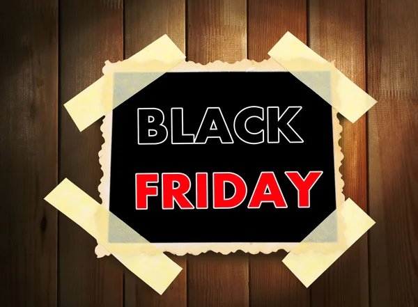 Black Friday advertisement on wooden background — Stock Photo, Image