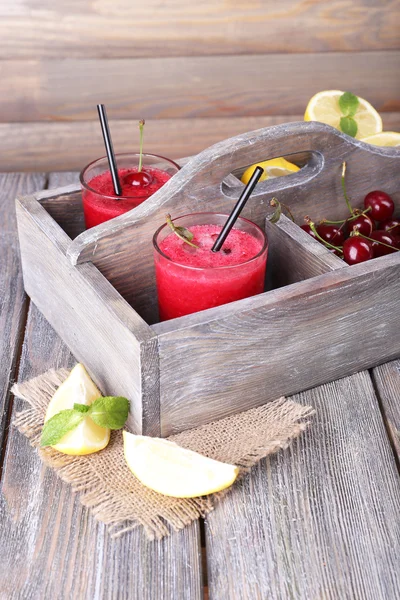 Fresh cold cherry cocktail with mint and lemon — Stock Photo, Image