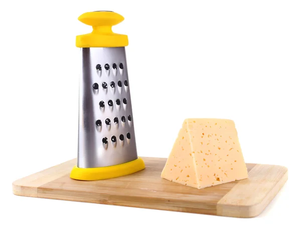 Metal grater and cheese isolated on white — Stock Photo, Image