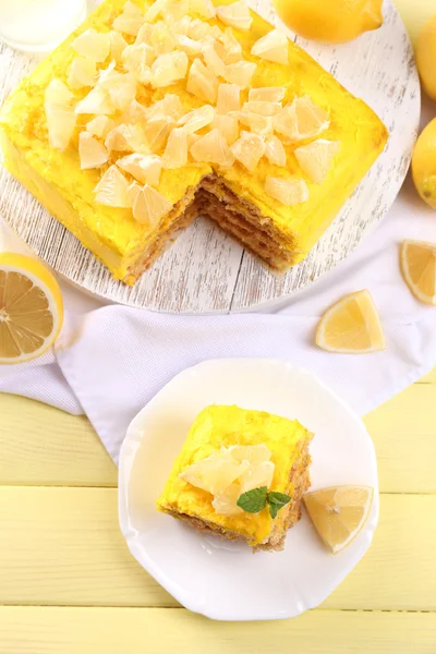 Tasty lemon dessert on wooden table — Stock Photo, Image