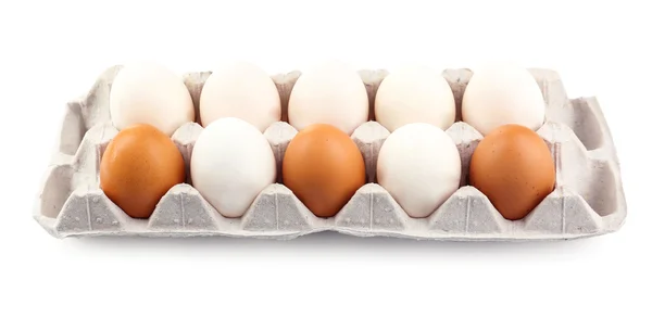 Different eggs in carton pack isolated on white — Stock Photo, Image