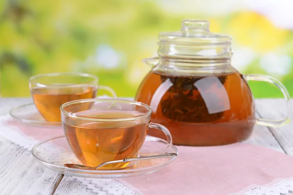 Teapot and cups of tea — Stock Photo, Image