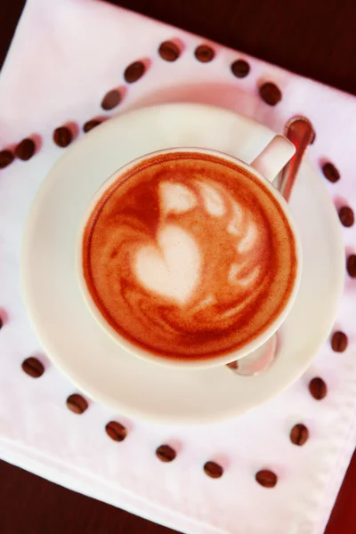 Tasse de café avec dessin mignon dans le café — Photo