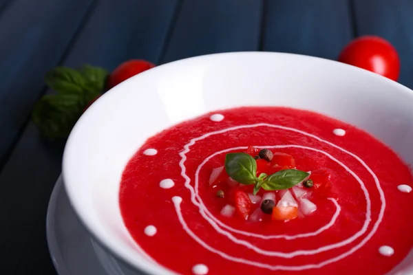 Gazpacho soup on color wooden background — Stock Photo, Image