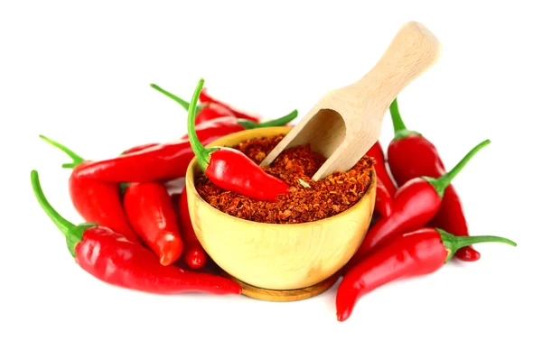 Milled red chili pepper in wooden bowl isolated on white — Stock Photo, Image