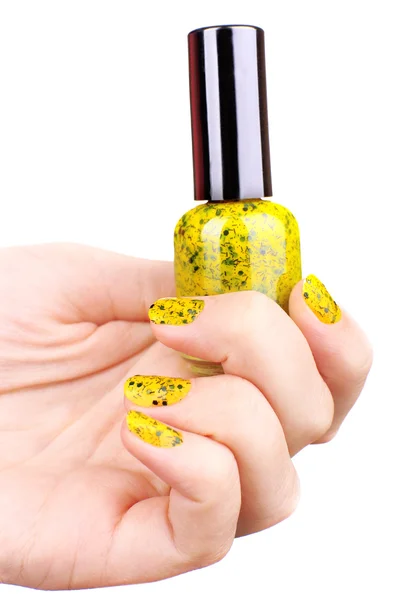 Nail polish in hand — Stock Photo, Image