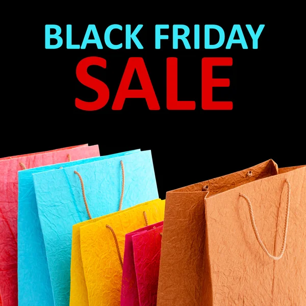 Bags and Black Friday Sale text — Stock Photo, Image
