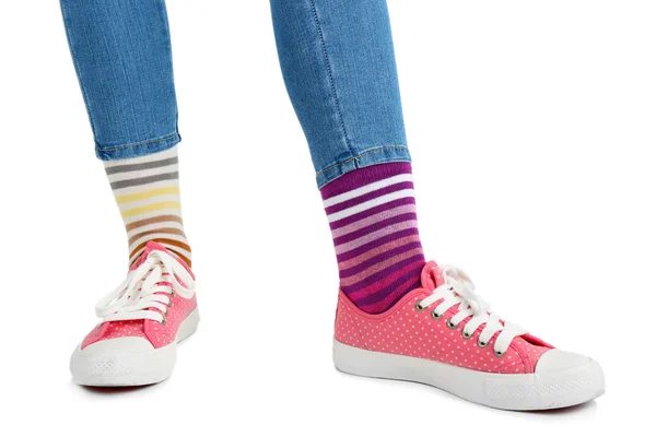 Female legs in colorful socks — Stock Photo, Image