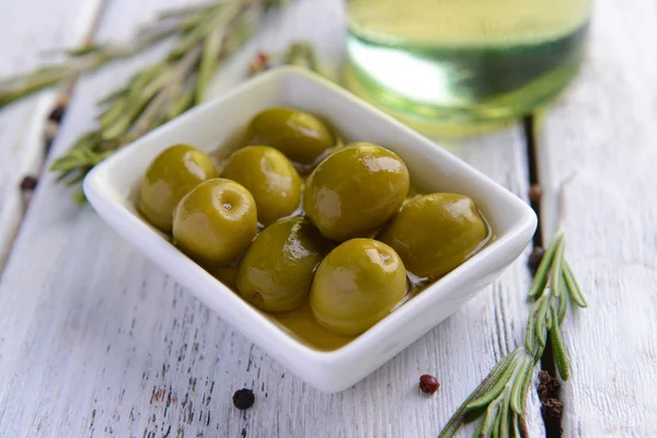 Marinated olives on table — Stock Photo, Image