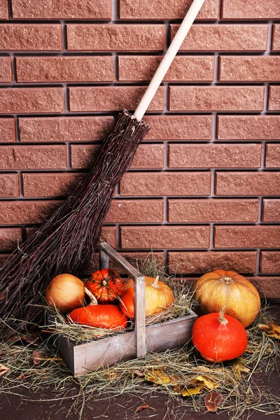 Pumpkins in wooden box — Stock Photo, Image