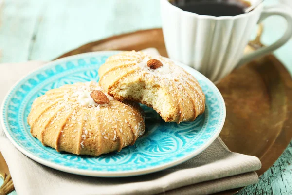 Tazza di caffè con gustoso biscotto — Foto Stock