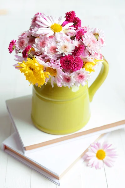 Beautiful flowers in pitcher — Stock Photo, Image