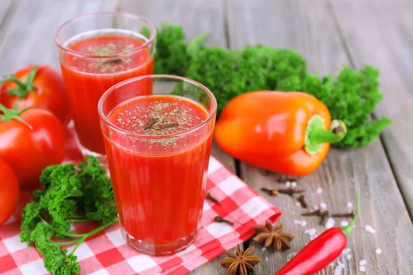 Tomato juice in glasses — Stock Photo, Image