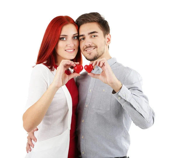 Loving couple with hearts isolated on white — Stock Photo, Image