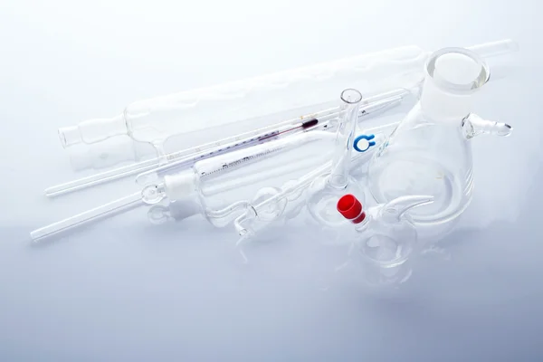 Laboratory glassware on white background — Stock Photo, Image