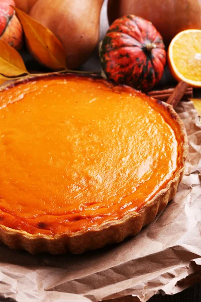 Homemade pumpkin pie on wooden background — Stock Photo, Image