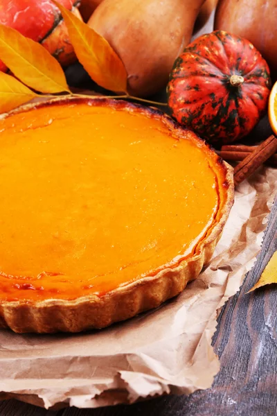 Homemade pumpkin pie on wooden background — Stock Photo, Image