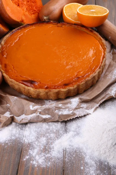 Ingredients for preparing pumpkin pie on wooden background — Stock Photo, Image