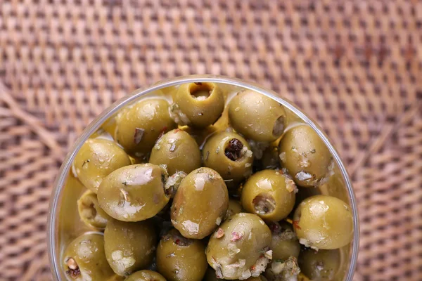 Green olives in oil — Stock Photo, Image