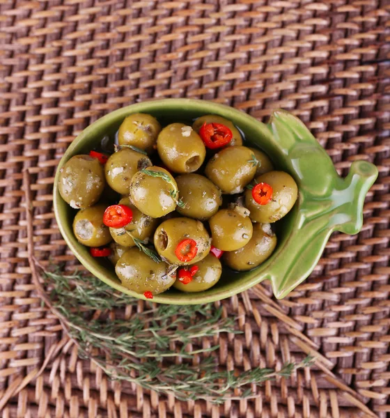 Green olives in oil — Stok fotoğraf