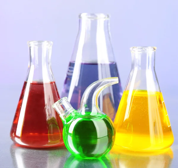 Different laboratory glassware — Stock Photo © belchonock 61035727