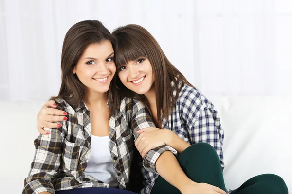 Beautiful girls twins at home — Stock Photo, Image