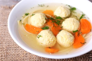 Soup with meatballs and noodles