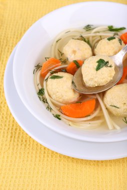 Soup with meatballs and noodles